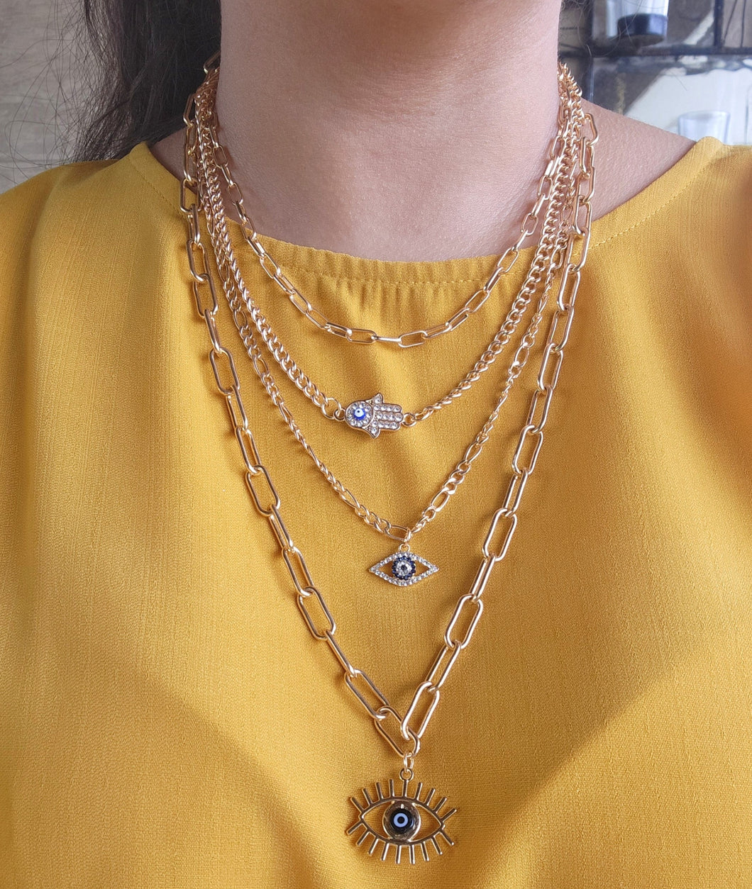 Evil eye and hamsa layered necklace