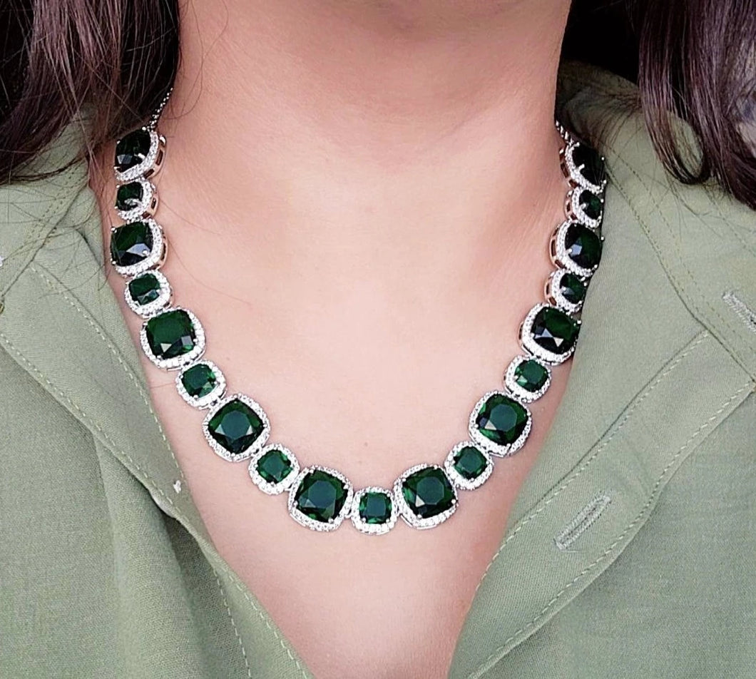 Emerald studded white gold necklace