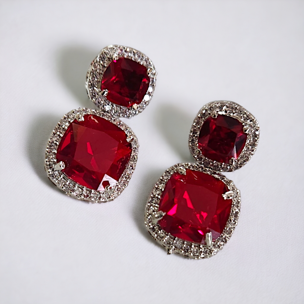 Ruby studded white gold earrings