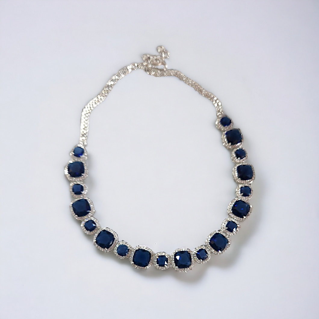 Blue sapphire studded white gold necklace