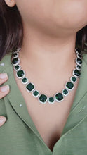 Load and play video in Gallery viewer, Emerald studded white gold necklace
